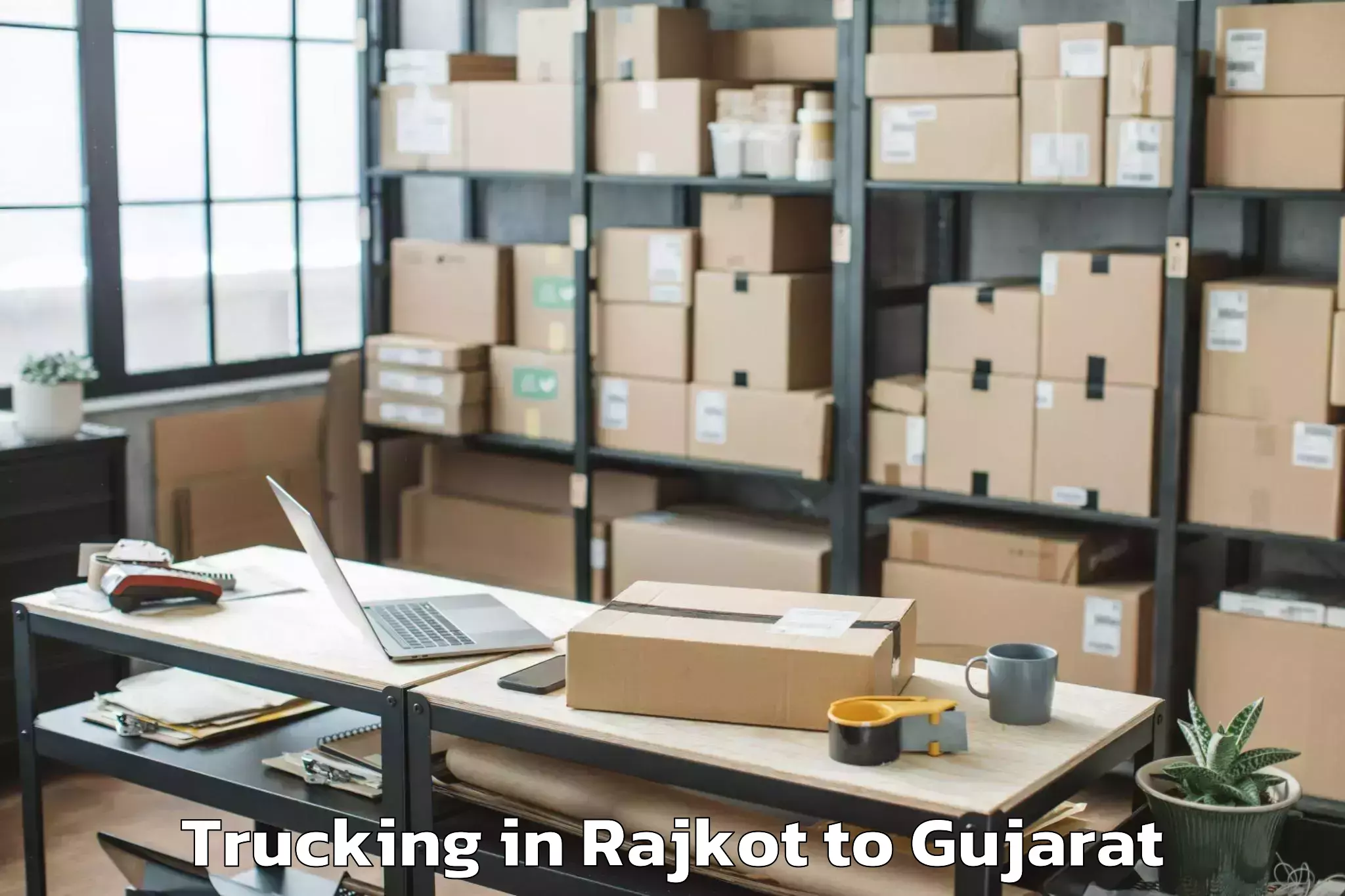 Easy Rajkot to Sankheda Trucking Booking